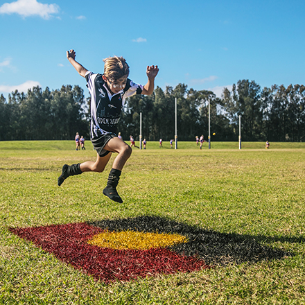 kid jump on field